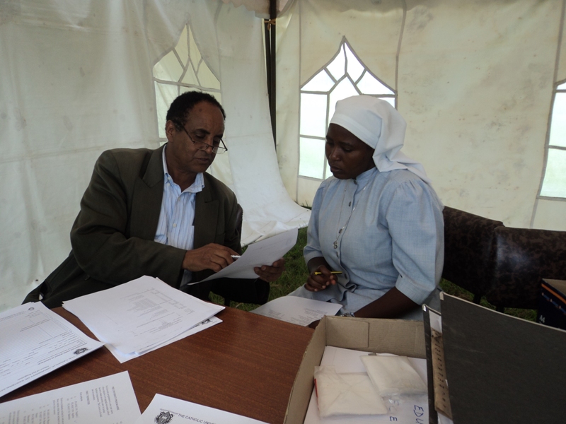 Sr. Mary Annet signs her bridge course agreement May 2013